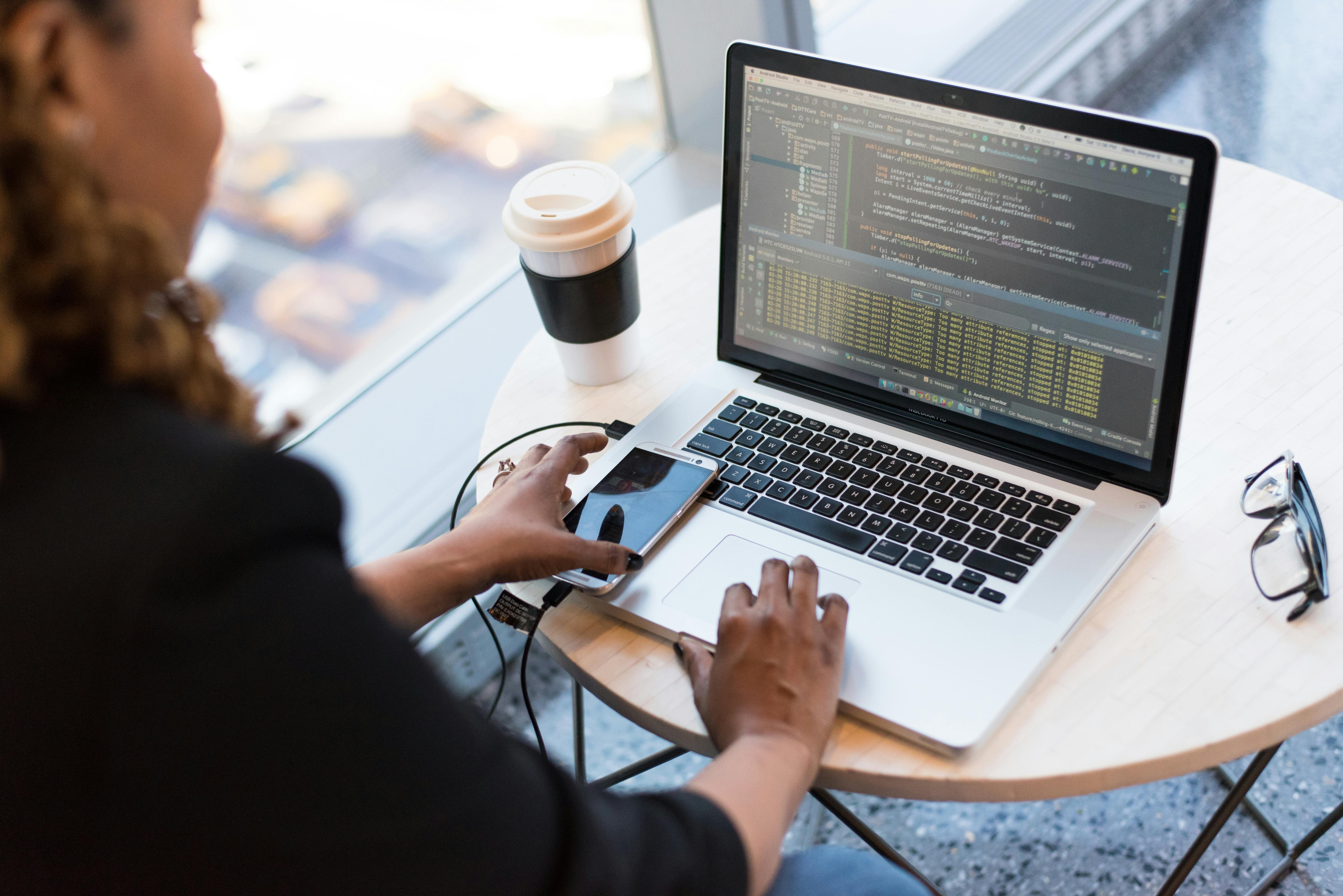 Girl working in front of a laptop